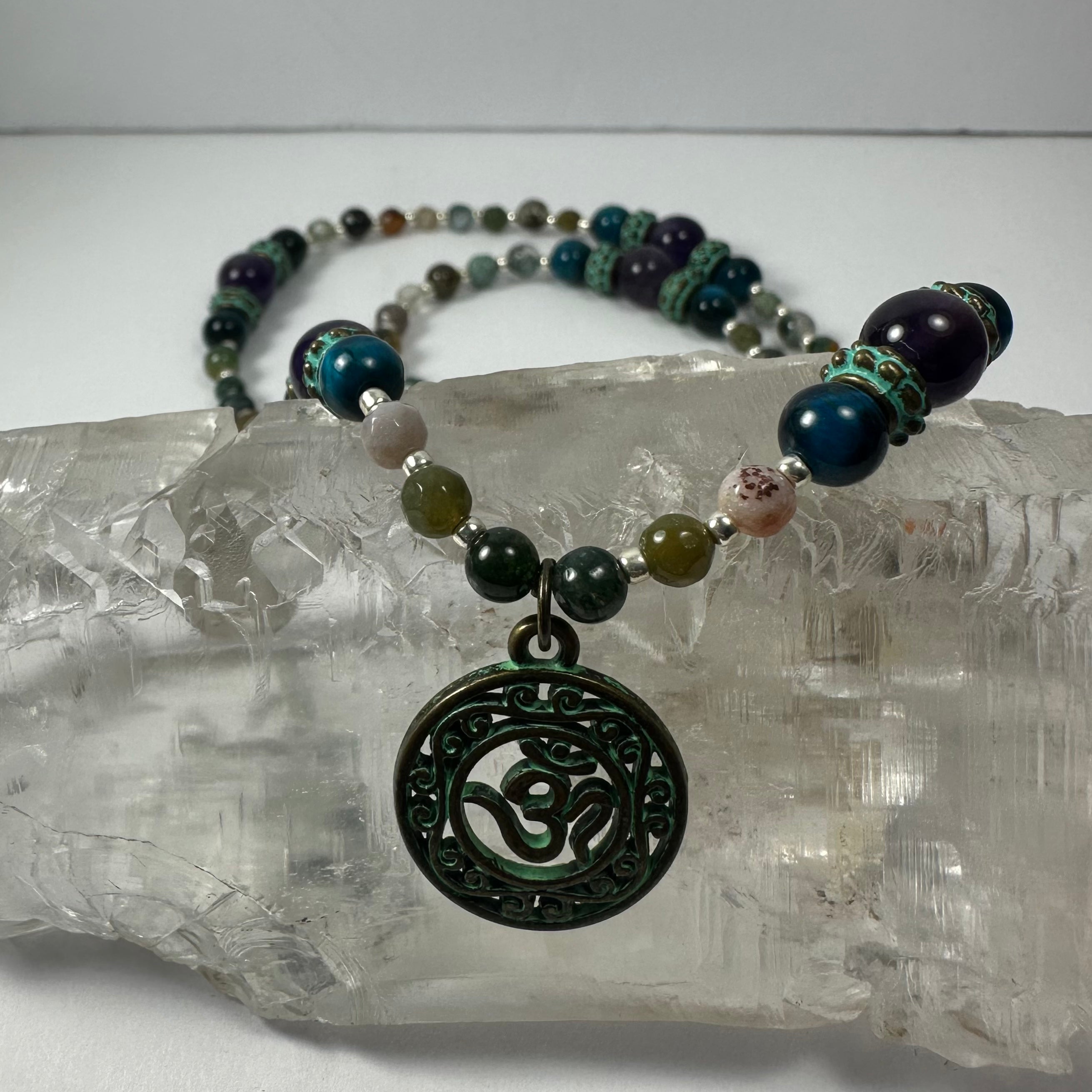 Bronze Patina 'Om' Pendant on Mixed Bead Necklace | Jewelry | Wiccan Center