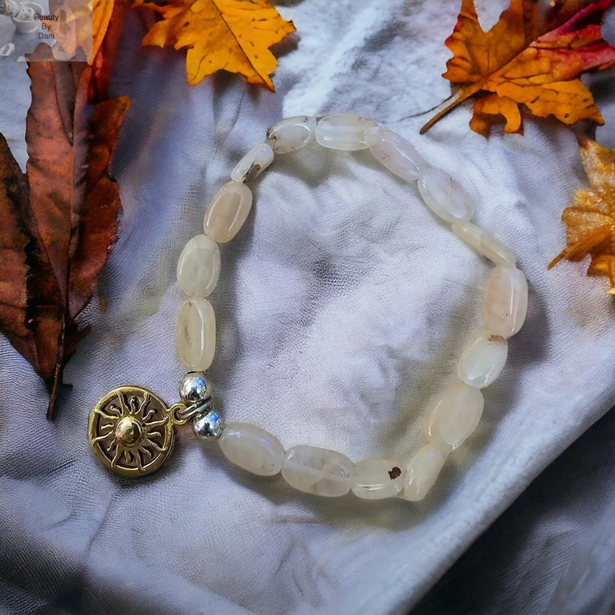 Quartz Bracelet with Sun Charm