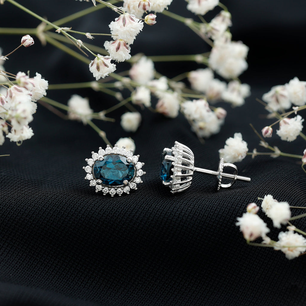 2.2 Carat Oval London Blue Topaz Stud Earrings with Moissanite Halo