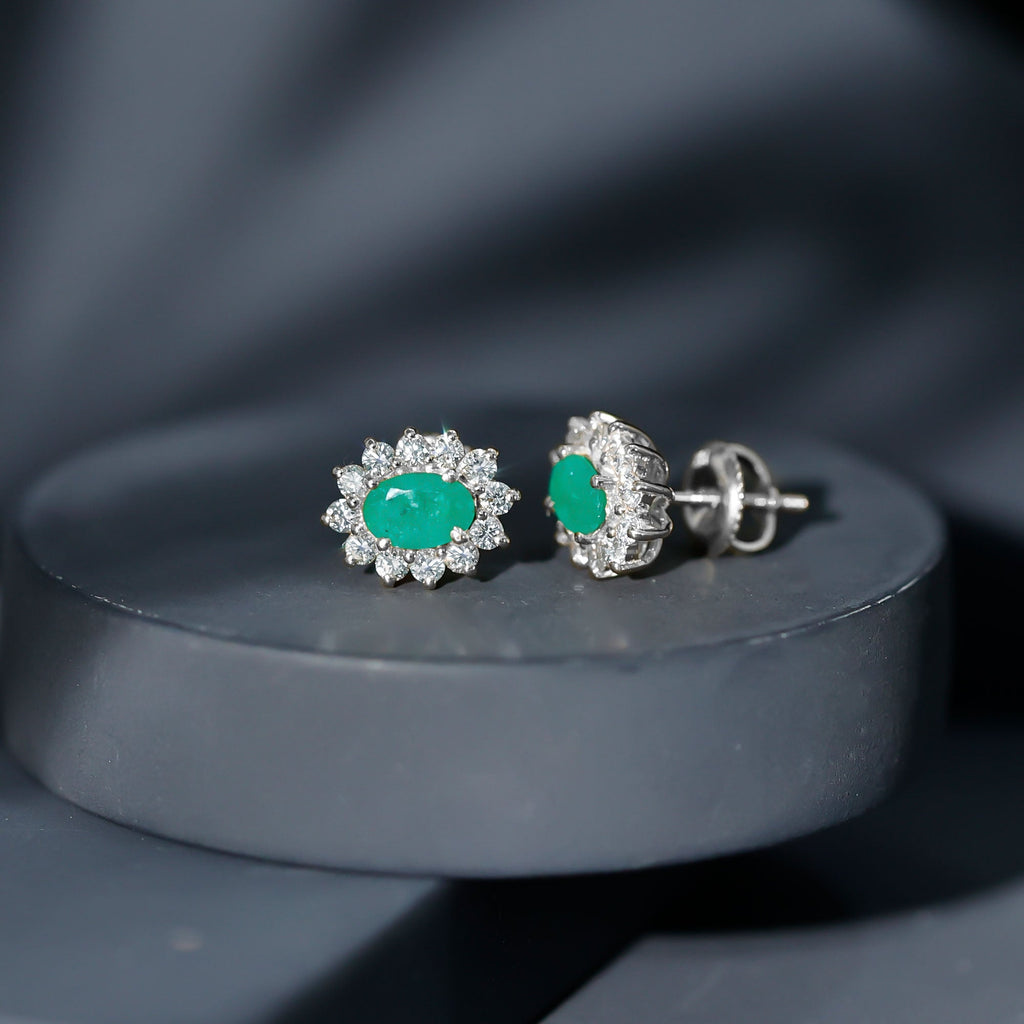 Natural 0.8 Carat Oval Cut Emerald and Diamond Earrings