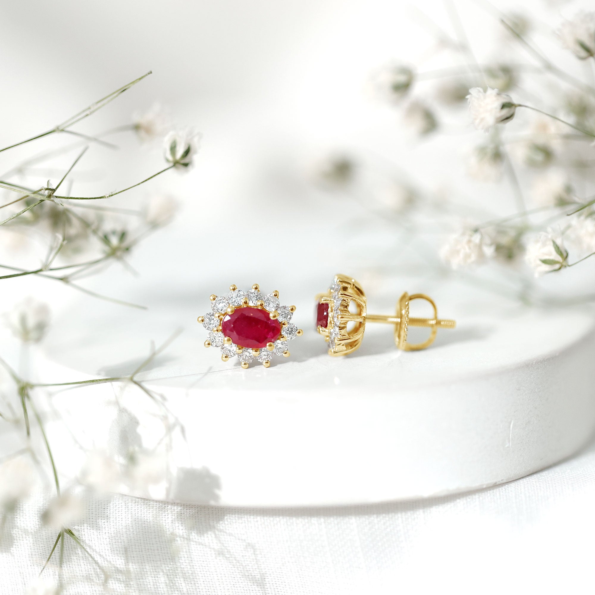 Genuine Oval Cut Ruby and Diamond Halo Stud Earrings
