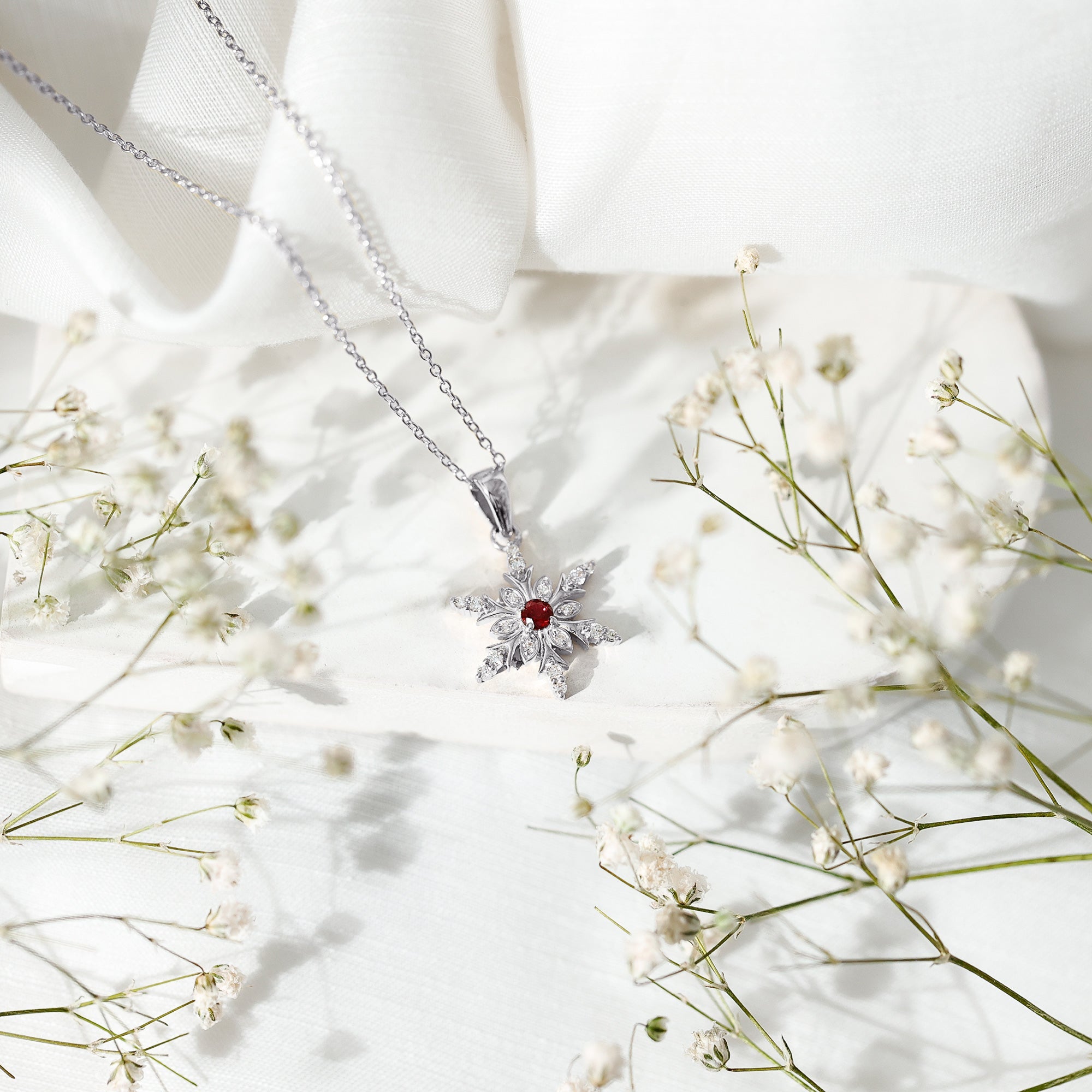 Lab Created Ruby Snowflake Pendant with Diamond Accent