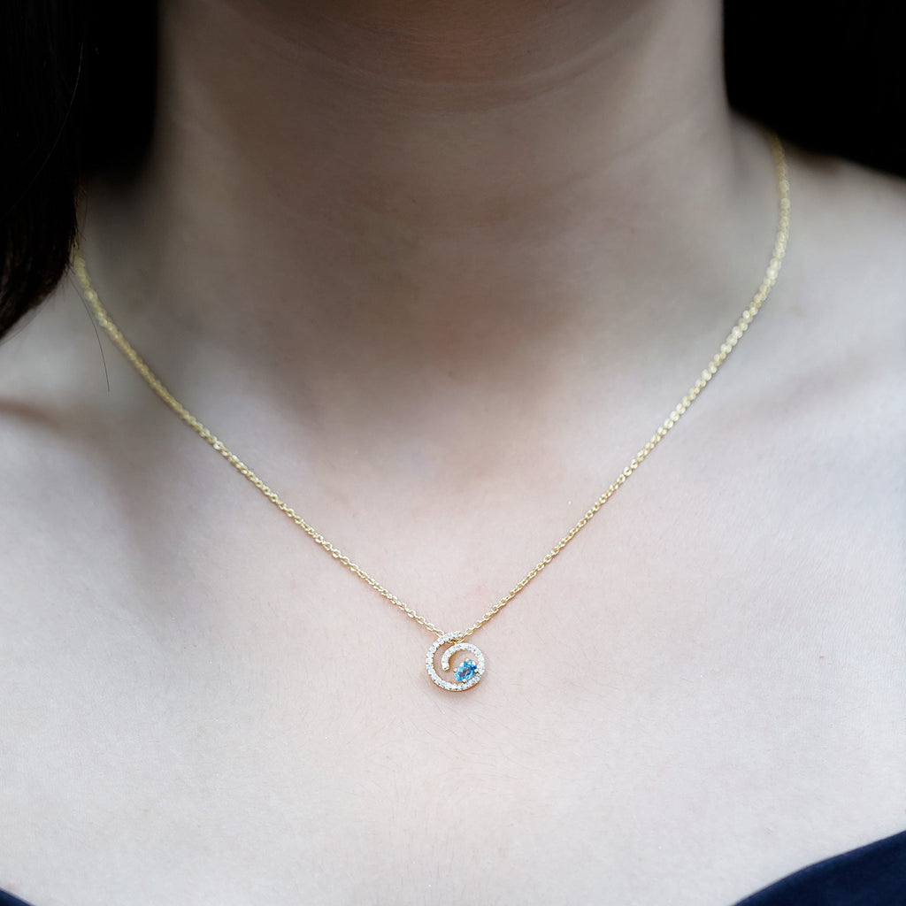 Genuine Sky Blue Topaz and Diamond Swirl Necklace with Silver Chain