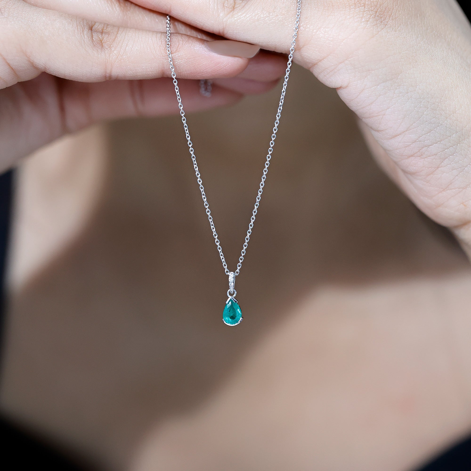 Pear Cut Emerald Solitaire Pendant with Diamond Accent Bail