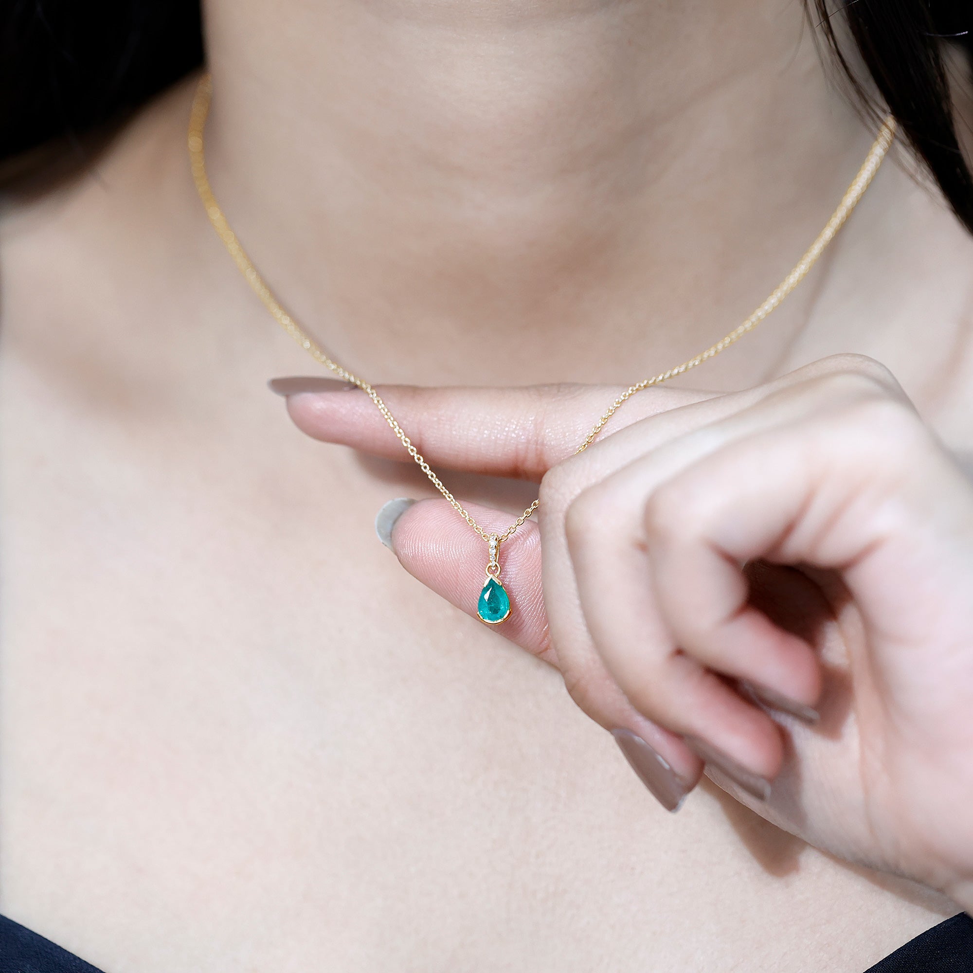 Pear Cut Emerald Solitaire Pendant with Diamond Accent Bail
