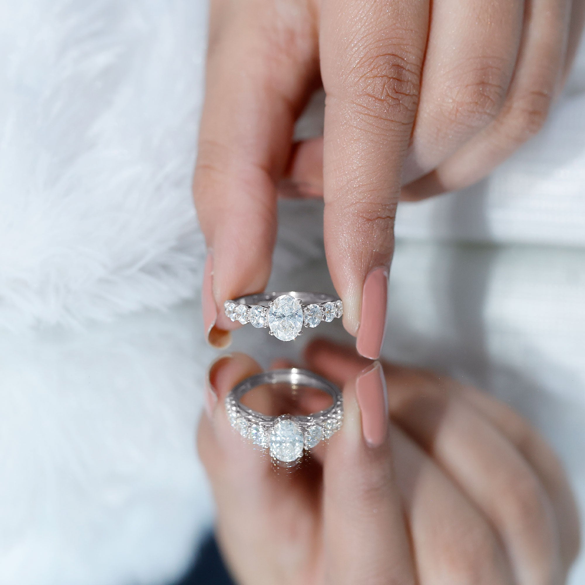 1.2 Carat Oval Cut Moissanite Side Stone Engagement Ring