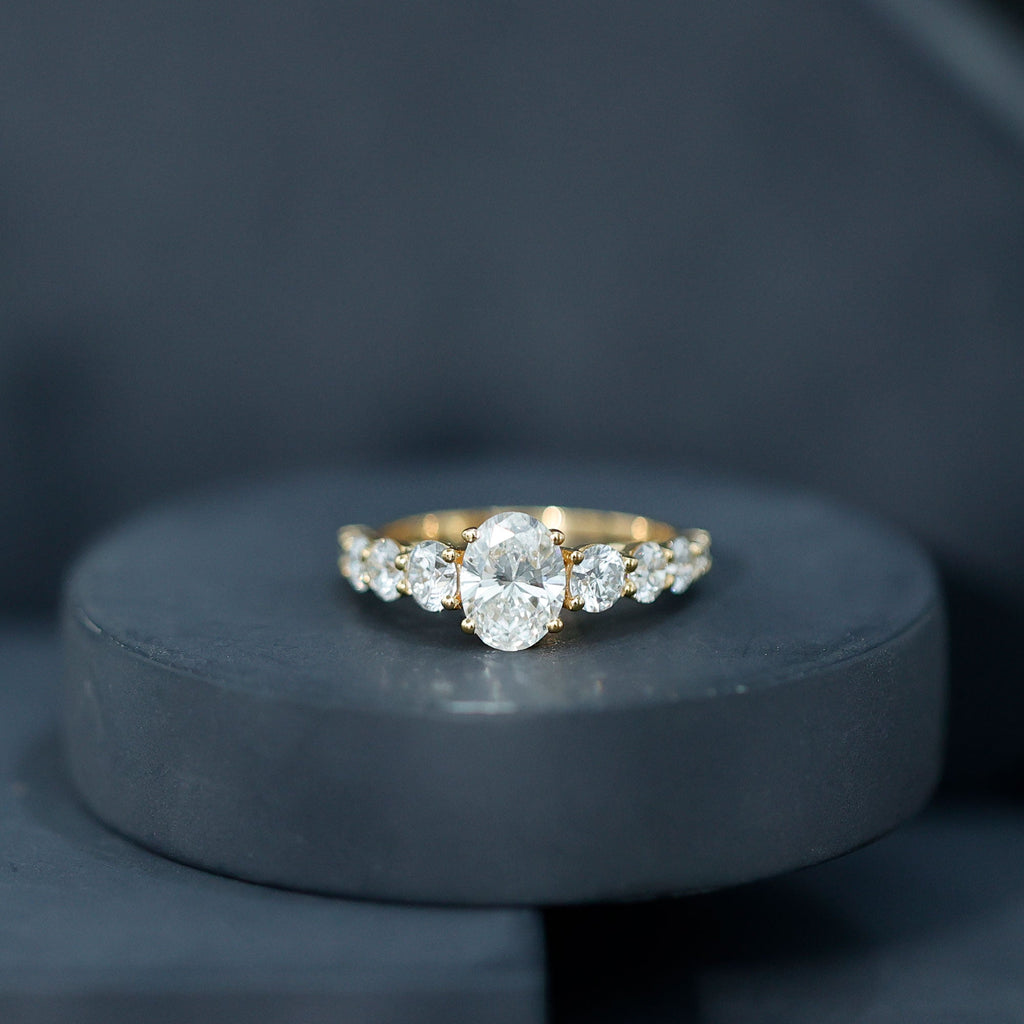 1.2 Carat Oval Cut Moissanite Side Stone Engagement Ring