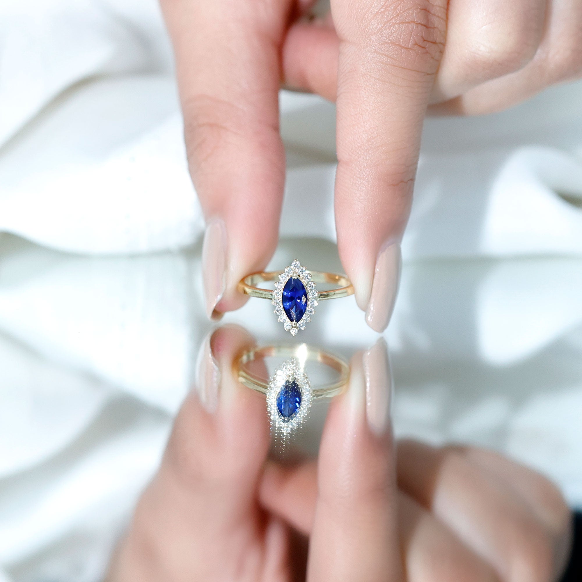 Marquise Cut Lab Grown Blue Sapphire and Diamond Halo Engagement Ring
