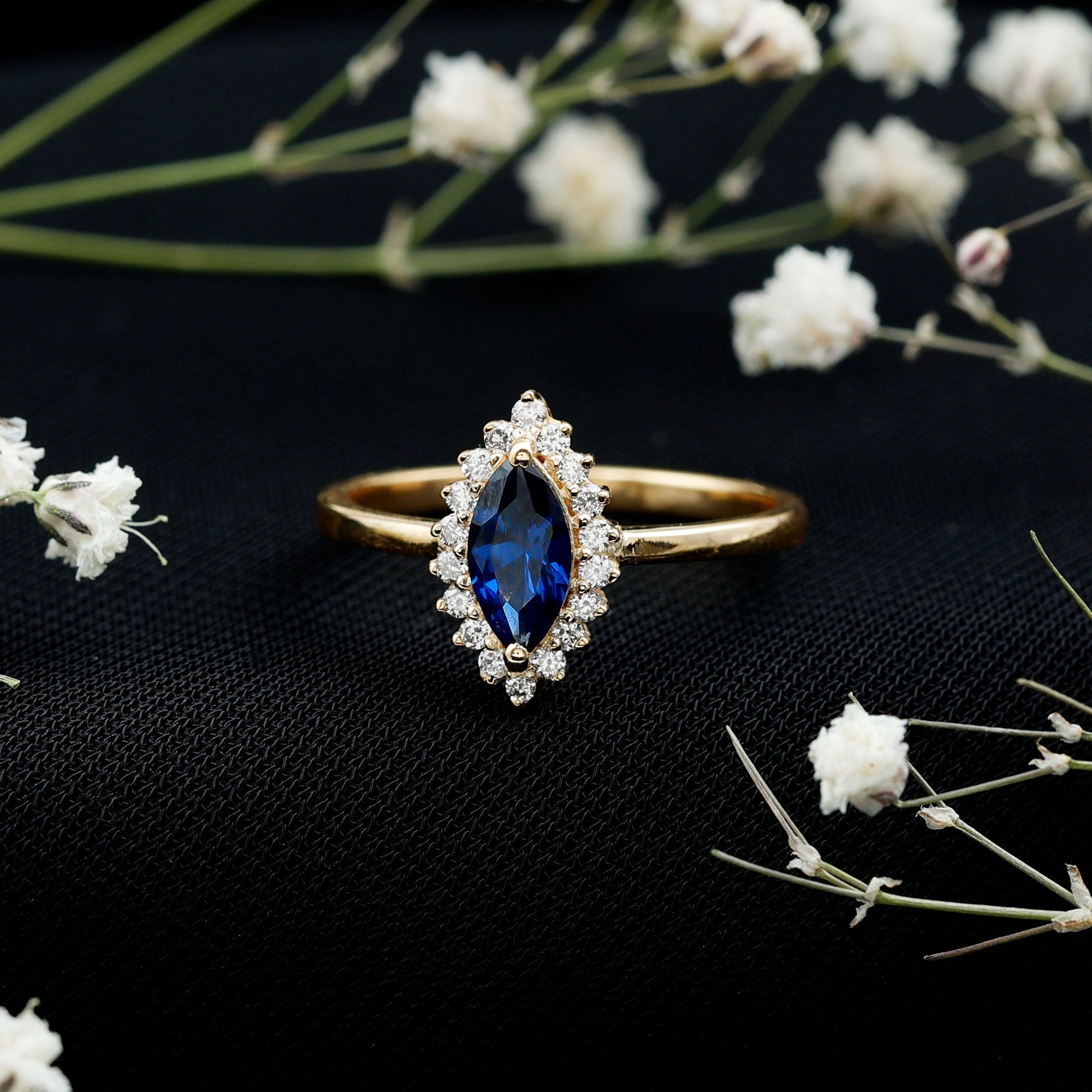 Marquise Cut Lab Grown Blue Sapphire and Diamond Halo Engagement Ring