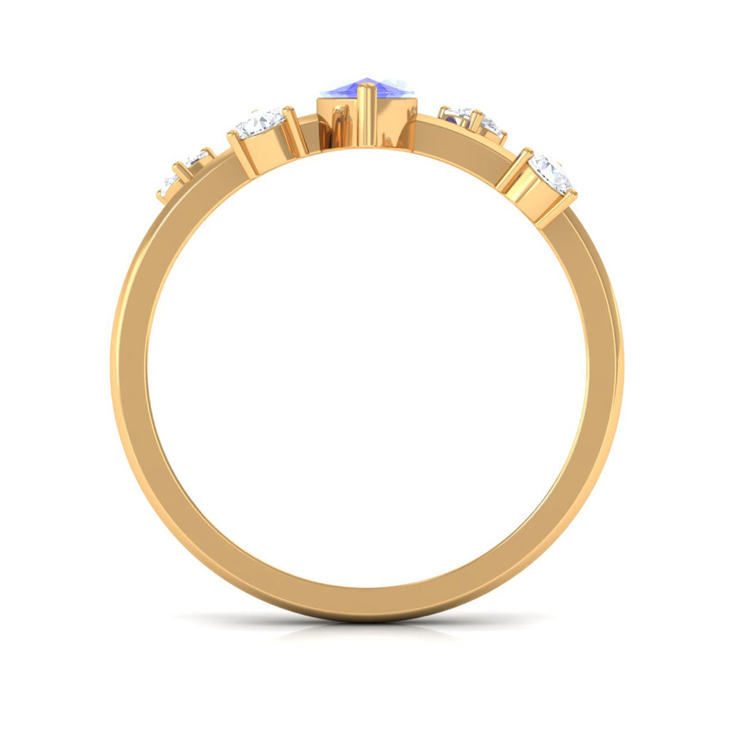 0.6 Carat Marquise Tanzanite Solitaire Ring with Scatter Diamond