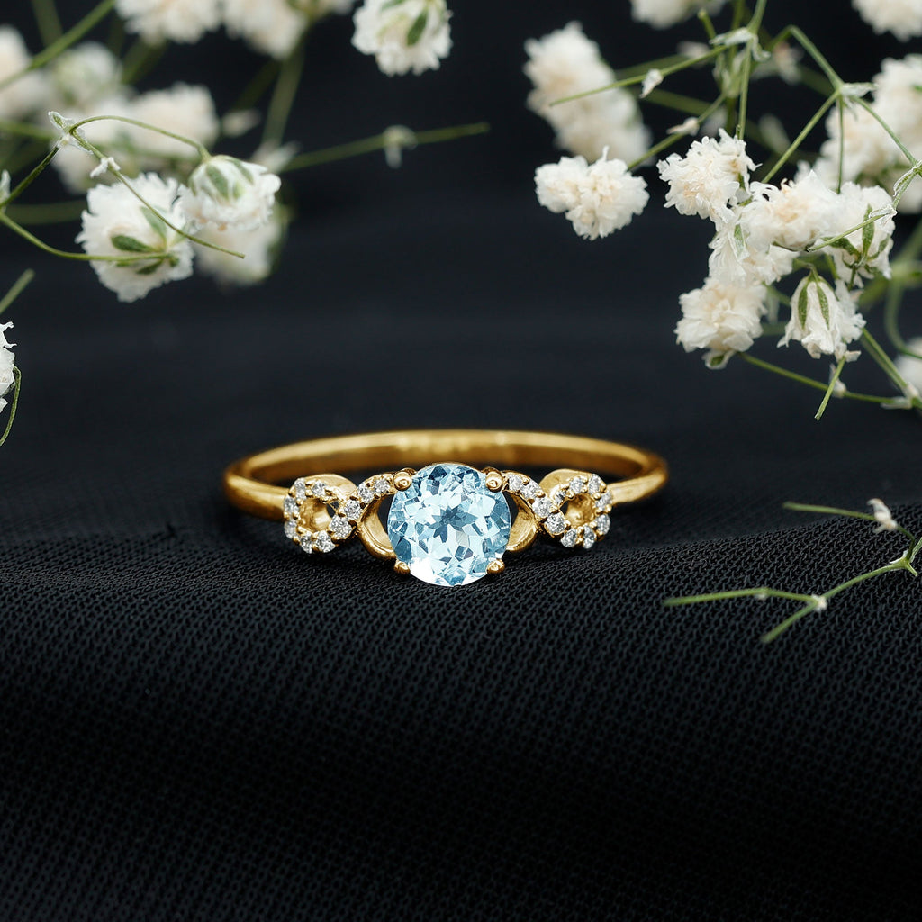 Round Shape Aquamarine and Diamond Infinity Engagement Ring