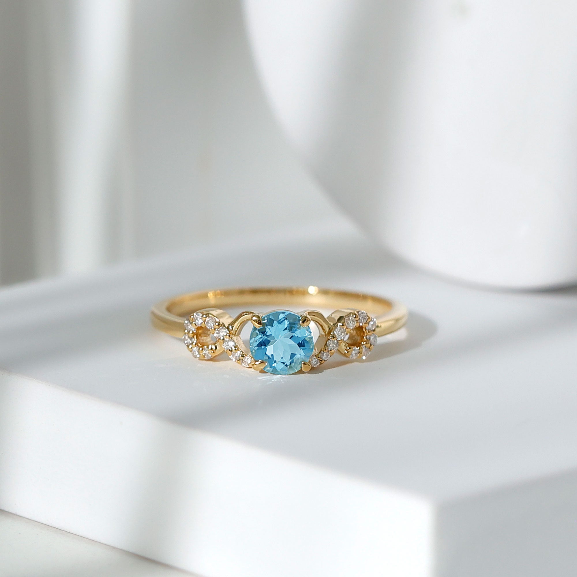 Round Shape Aquamarine and Diamond Infinity Engagement Ring