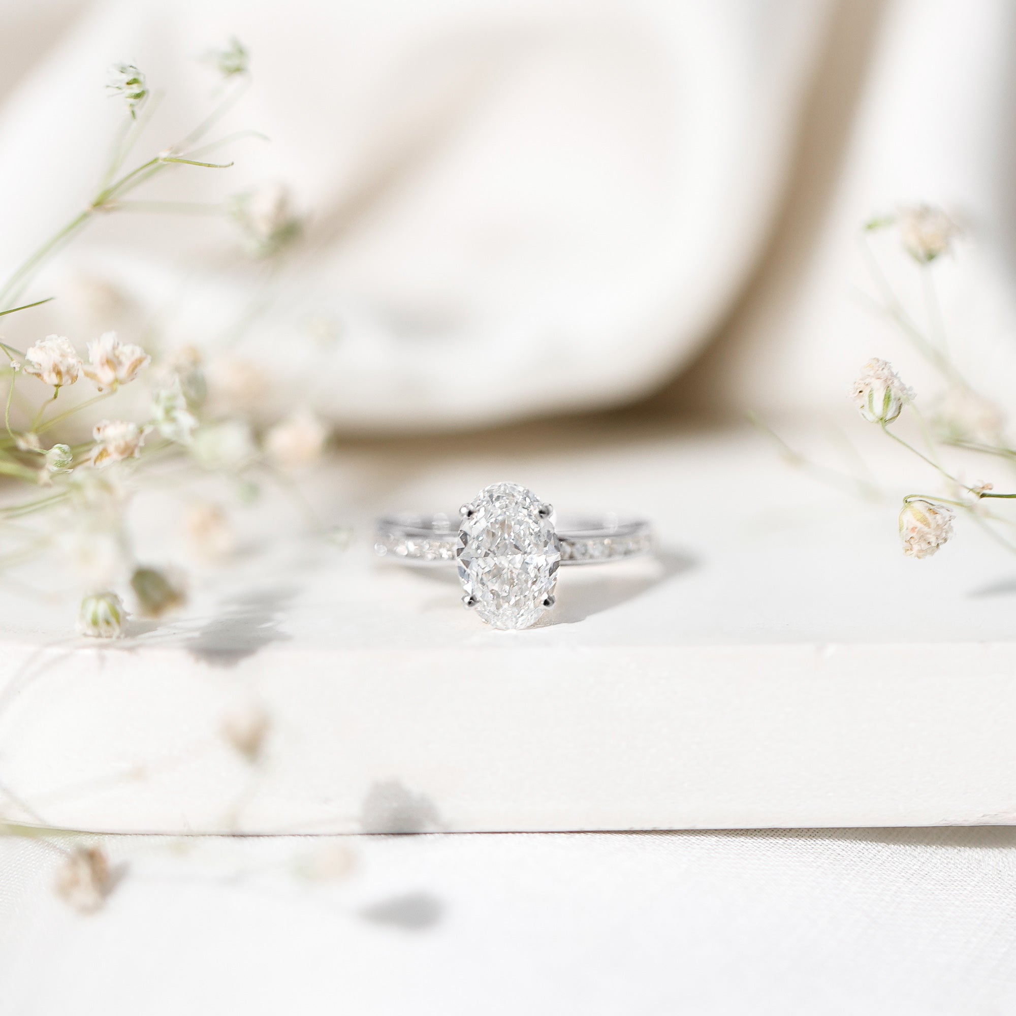 IGI Certified 2 Carat Lab Grown Diamond Oval Engagement Ring With Side Stones