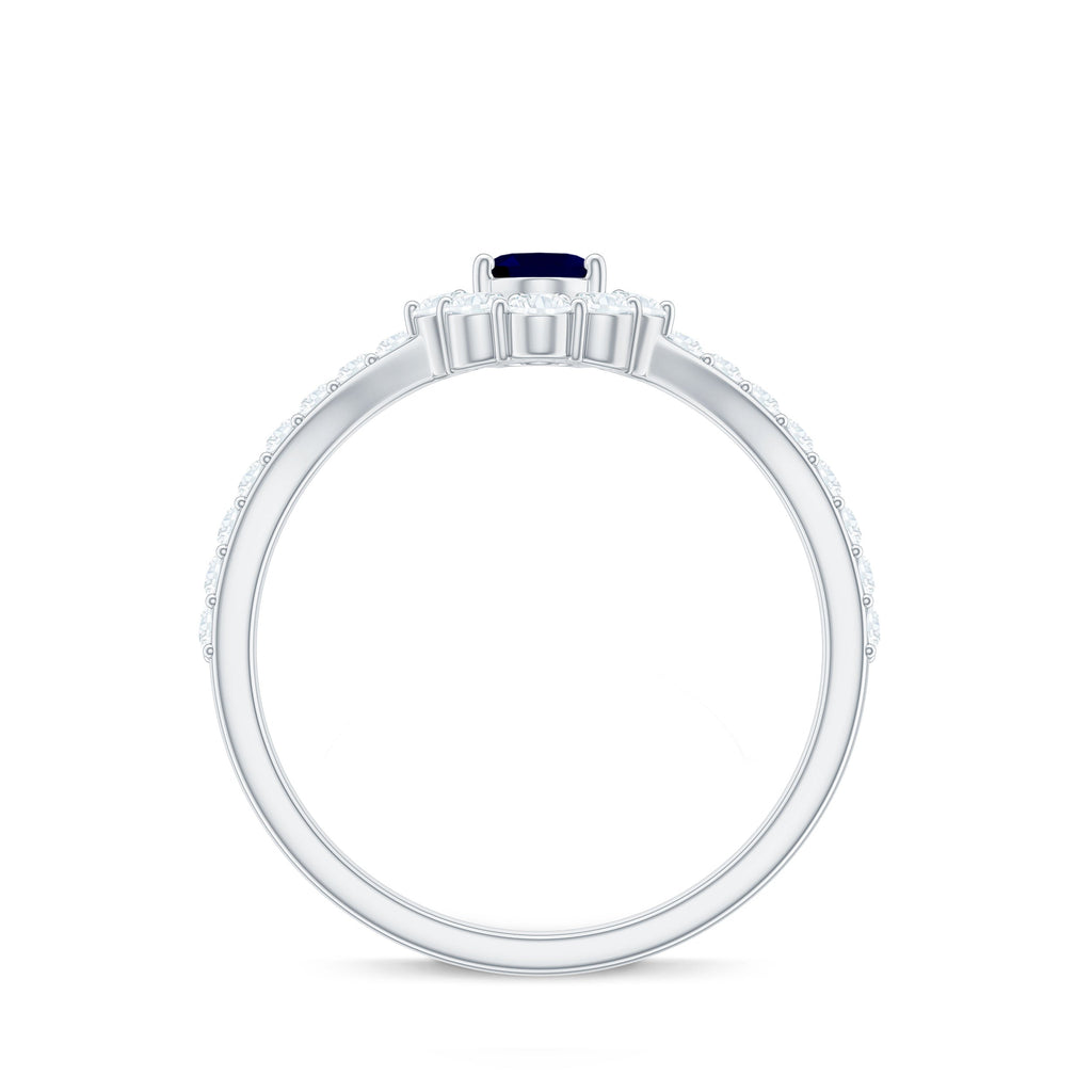 0.6 Carat Oval Cut Blue Sapphire and Diamond Chevron Ring