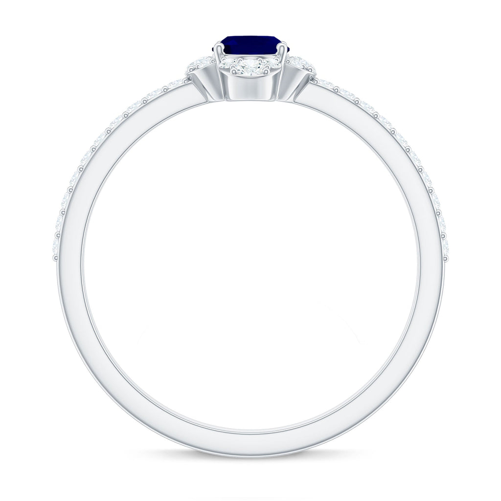 Natural 0.6 Carat Blue Sapphire Oval Engagement Ring with Diamond