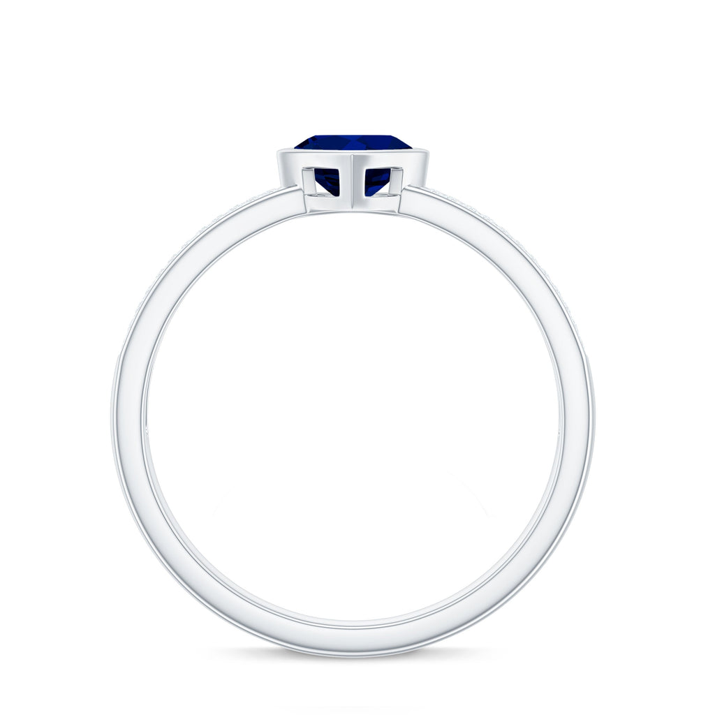 0.6 Carat Blue Sapphire Heart Solitaire Engagement Ring with Pave Diamond