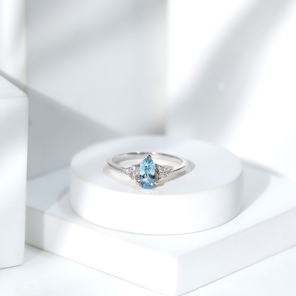 1 Carat Aquamarine Pear Engagement Ring with Diamond Trio