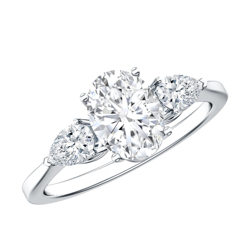 Oval and Pear Cut Moissanite Three Stone Engagement Ring