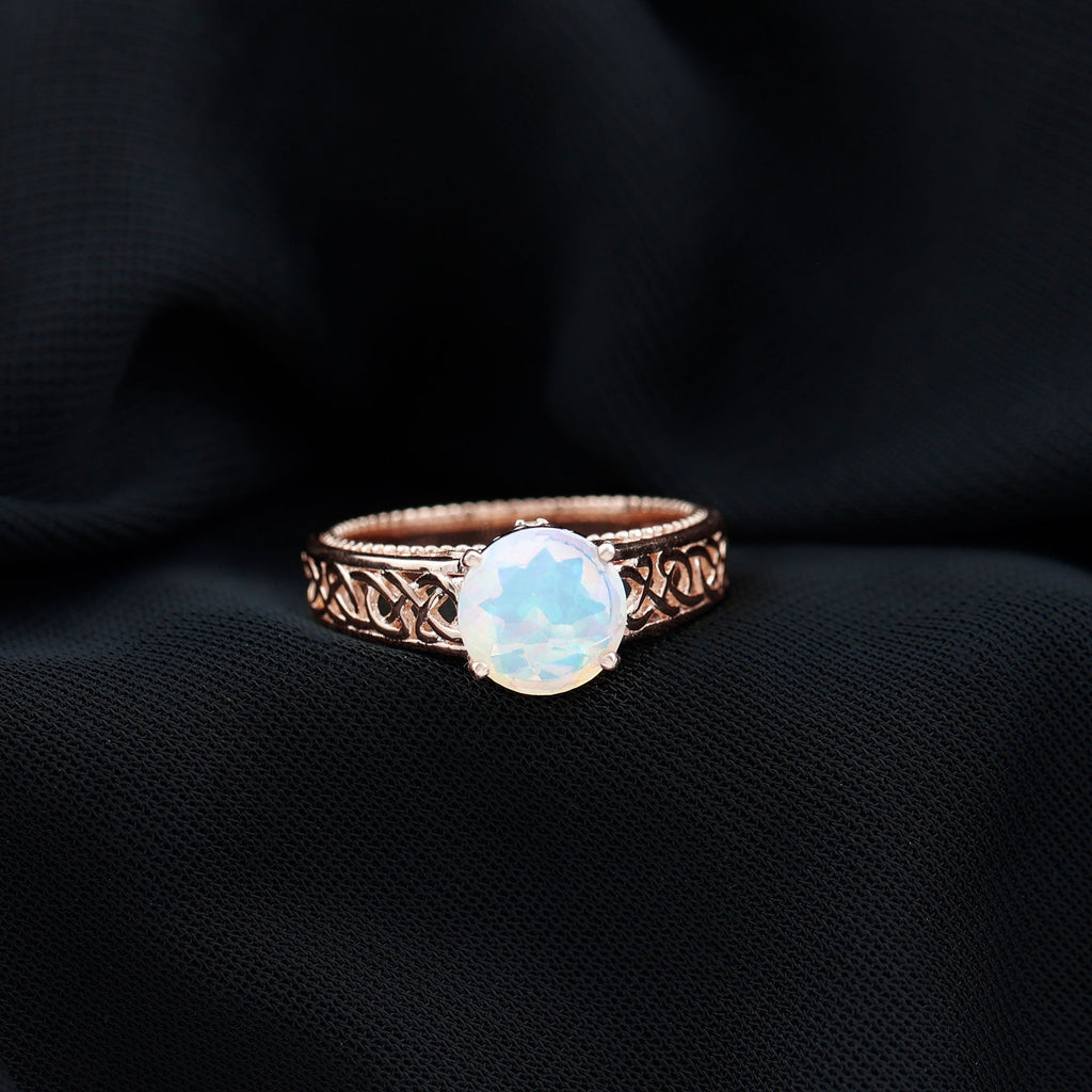 Ethiopian Opal Celtic Knot Engagement Ring with Surprise Diamond