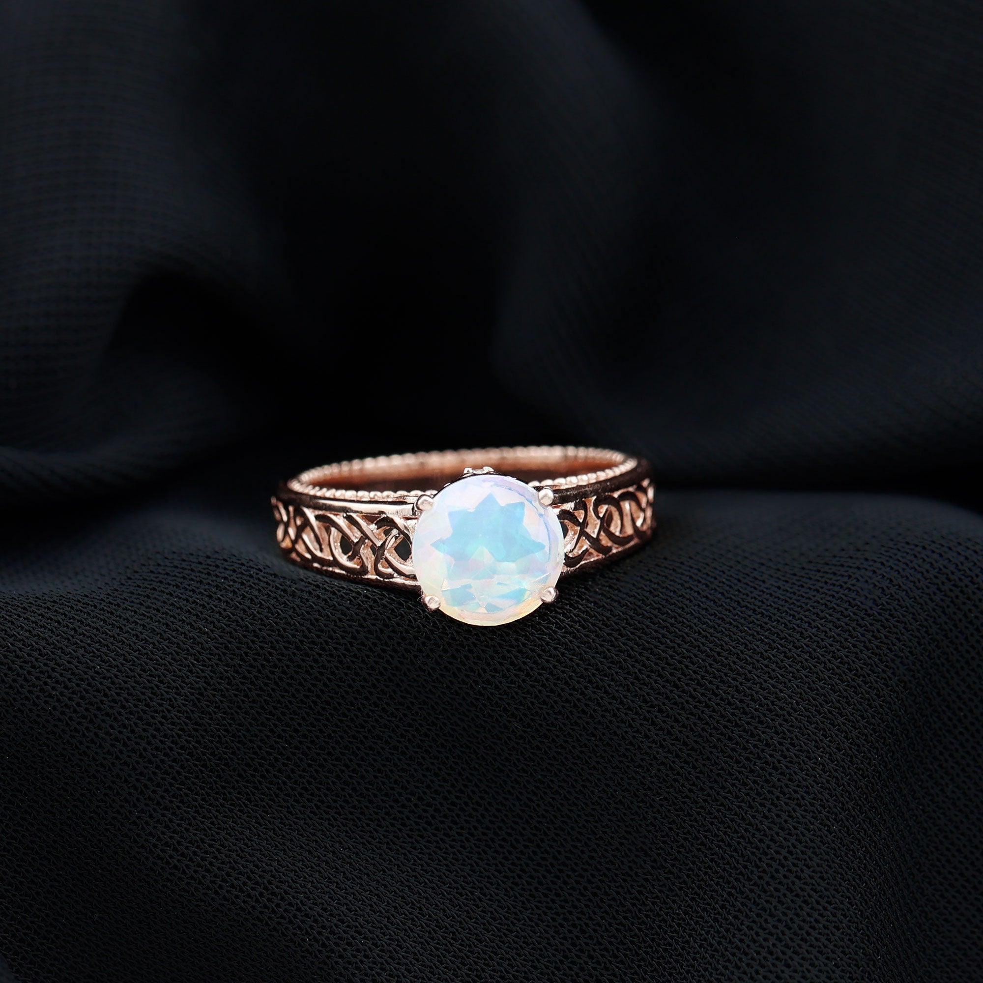 Ethiopian Opal Celtic Knot Engagement Ring with Surprise Diamond
