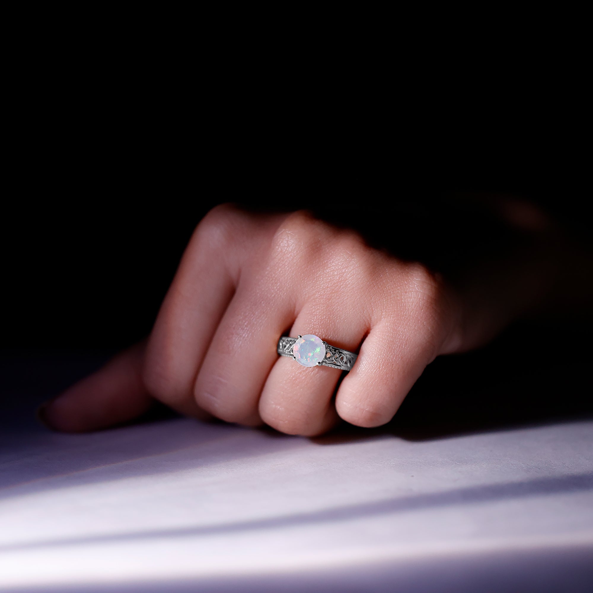 Ethiopian Opal Celtic Knot Engagement Ring with Surprise Diamond