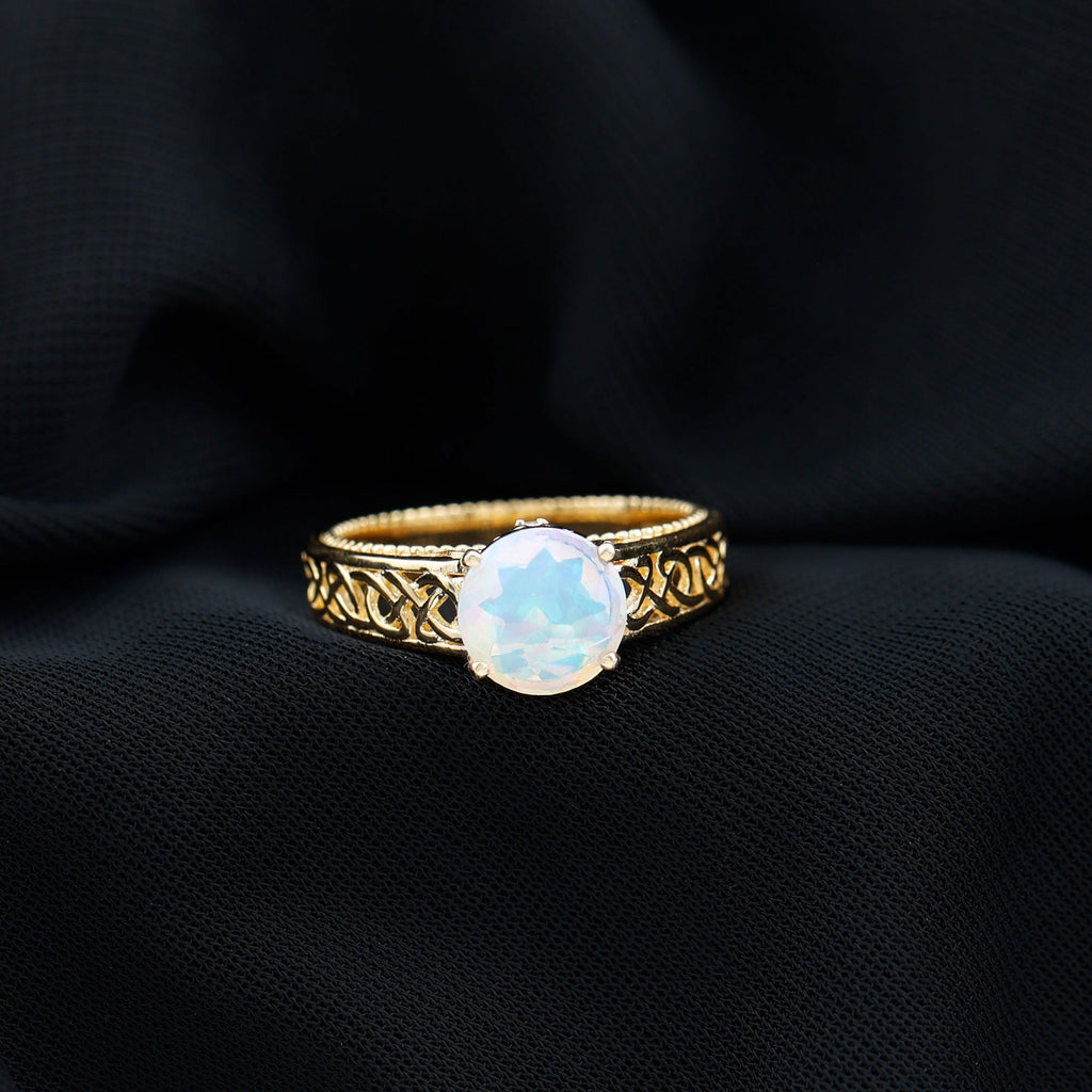 Ethiopian Opal Celtic Knot Engagement Ring with Surprise Diamond