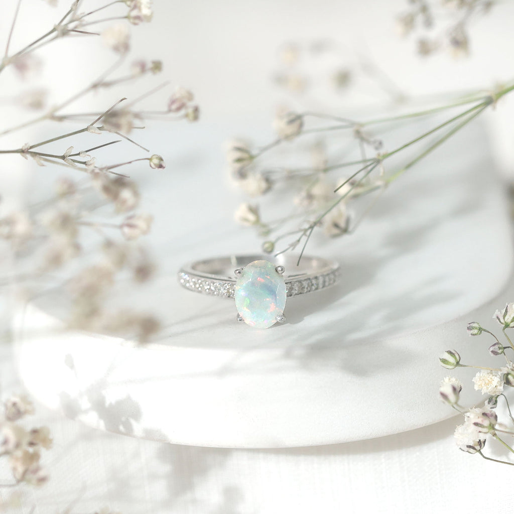 Natural 1.2 Carat Ethiopian Opal Oval Engagement Ring with Diamond Side Stones