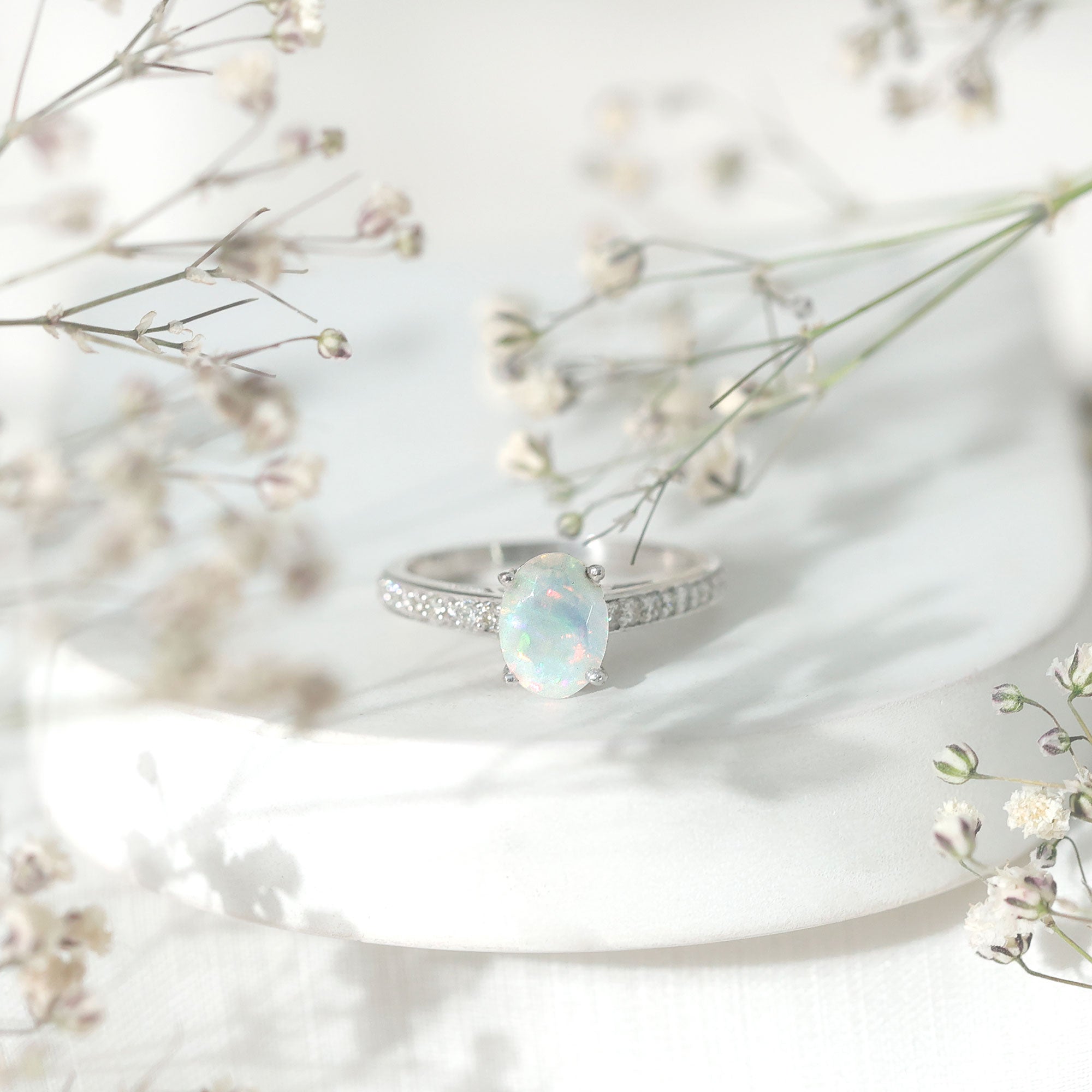 Natural 1.2 Carat Ethiopian Opal Oval Engagement Ring with Diamond Side Stones