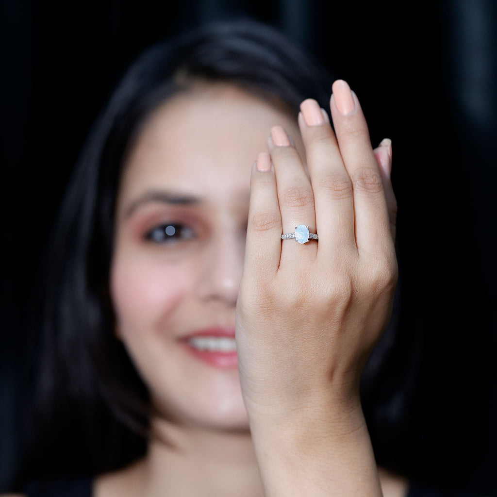 Natural 1.2 Carat Ethiopian Opal Oval Engagement Ring with Diamond Side Stones