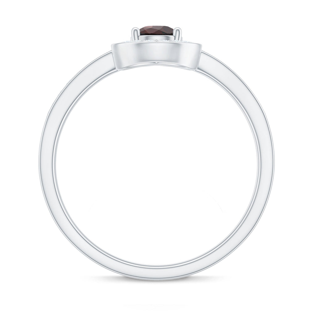 Classic Garnet Pear Shaped Engagement Ring with Diamond Halo