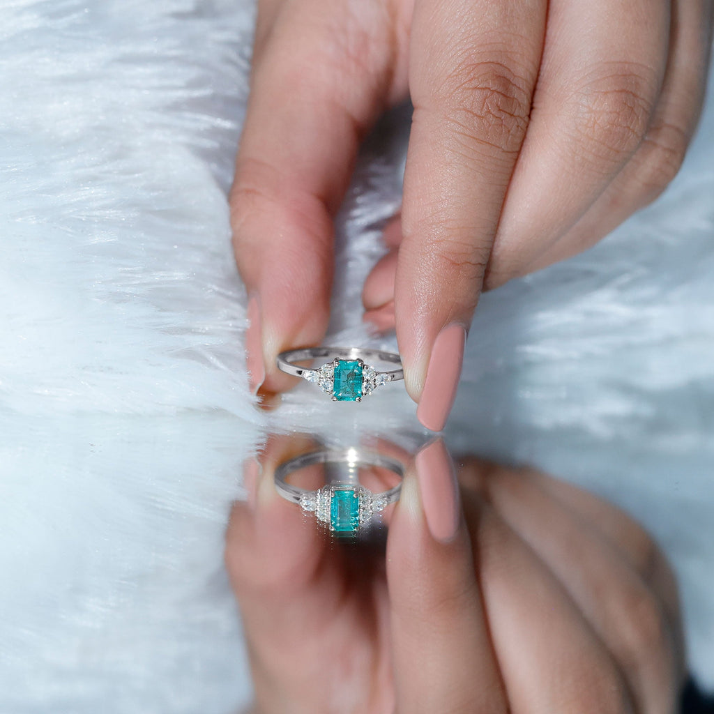Emerald Cut Emerald Engagement Ring with Diamond Trio