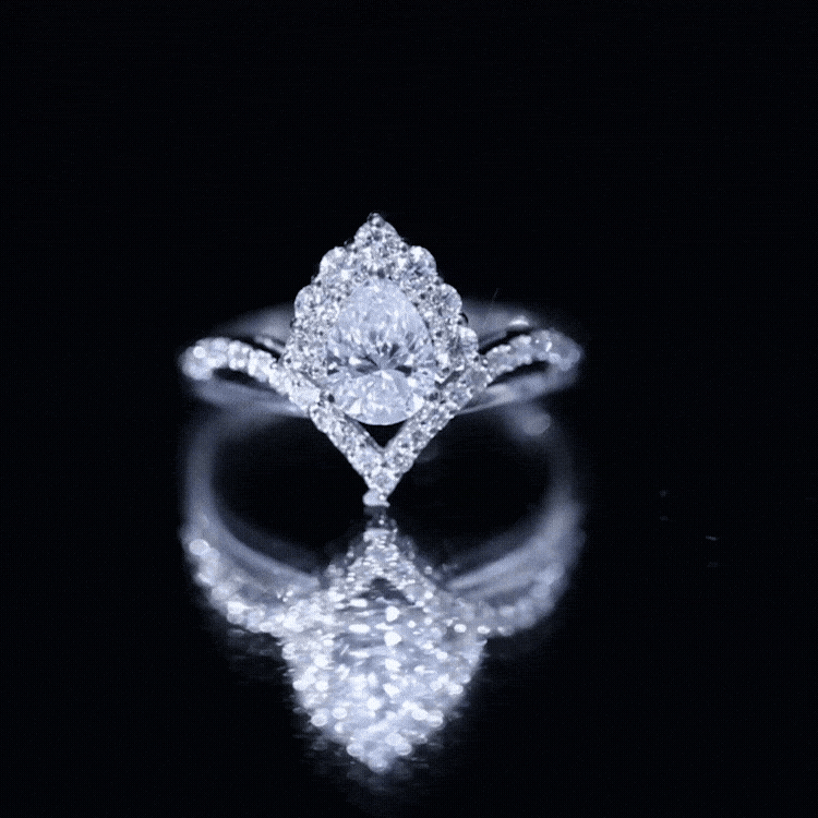 Designer 0.79 Carat Pear Shaped Moissanite Engagement Ring