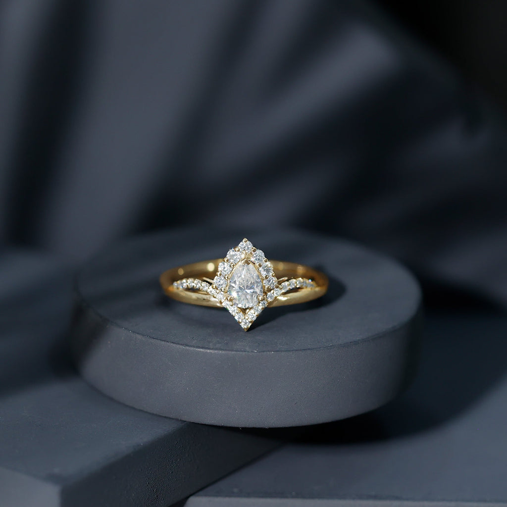 Designer 0.79 Carat Pear Shaped Moissanite Engagement Ring