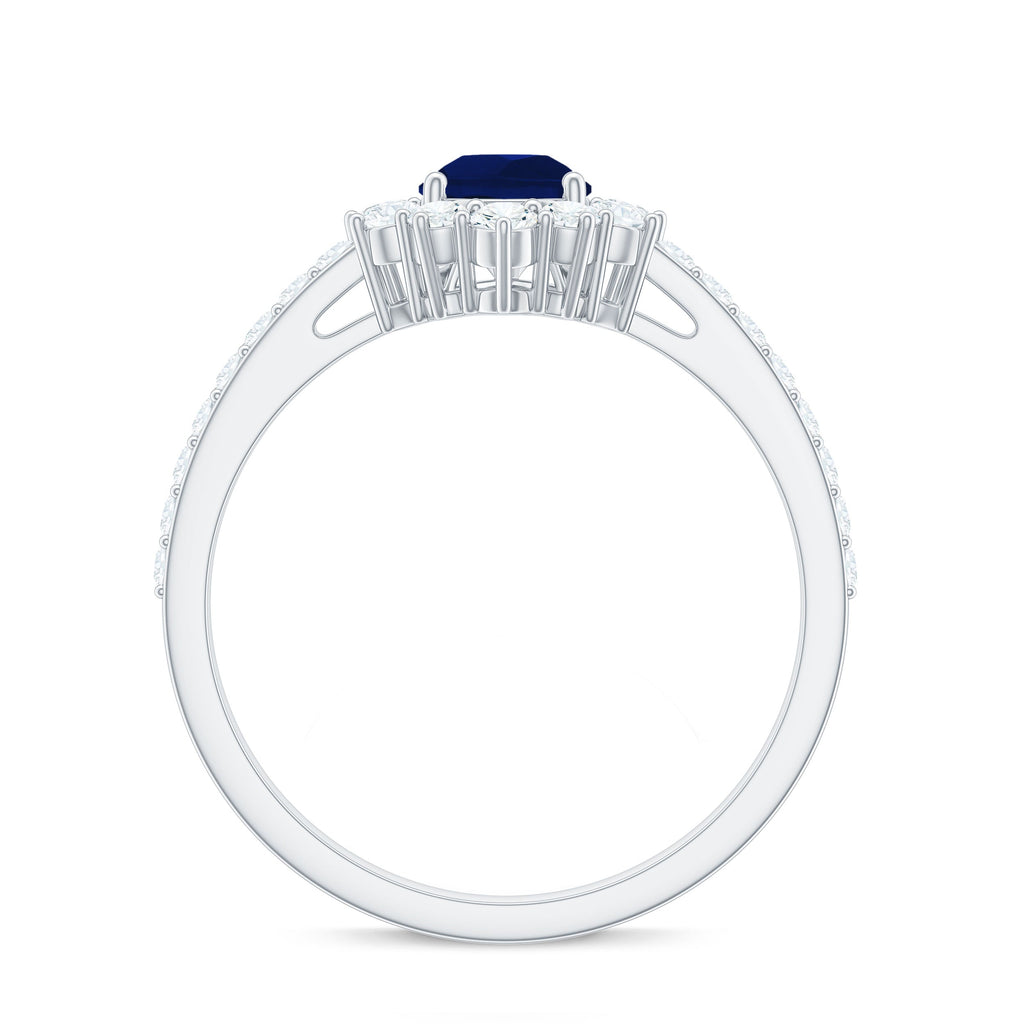 0.5 Carat Pear Shaped Blue Sapphire and Diamond Half Halo Engagement Ring