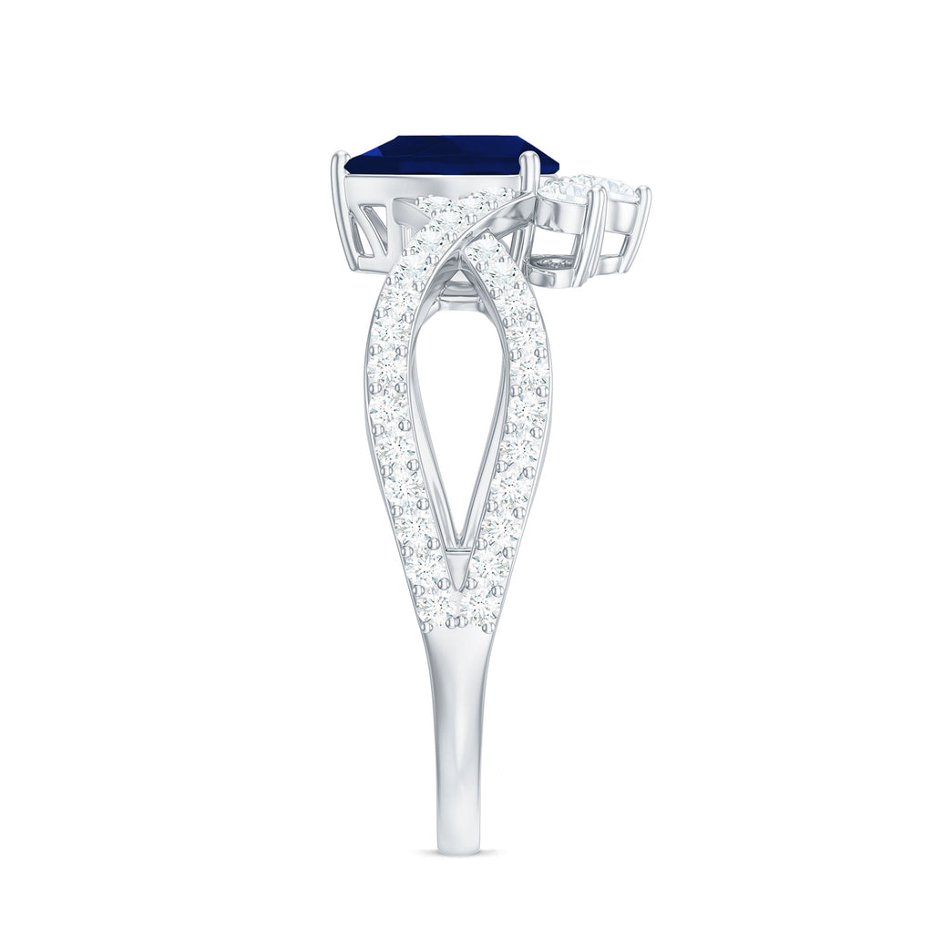 Real 0.5 Blue Sapphire Pear Shape Engagement Ring with Diamond Crossover