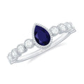 Pear Cut 0.5 Carat Blue Sapphire Engagement Ring with Diamonds