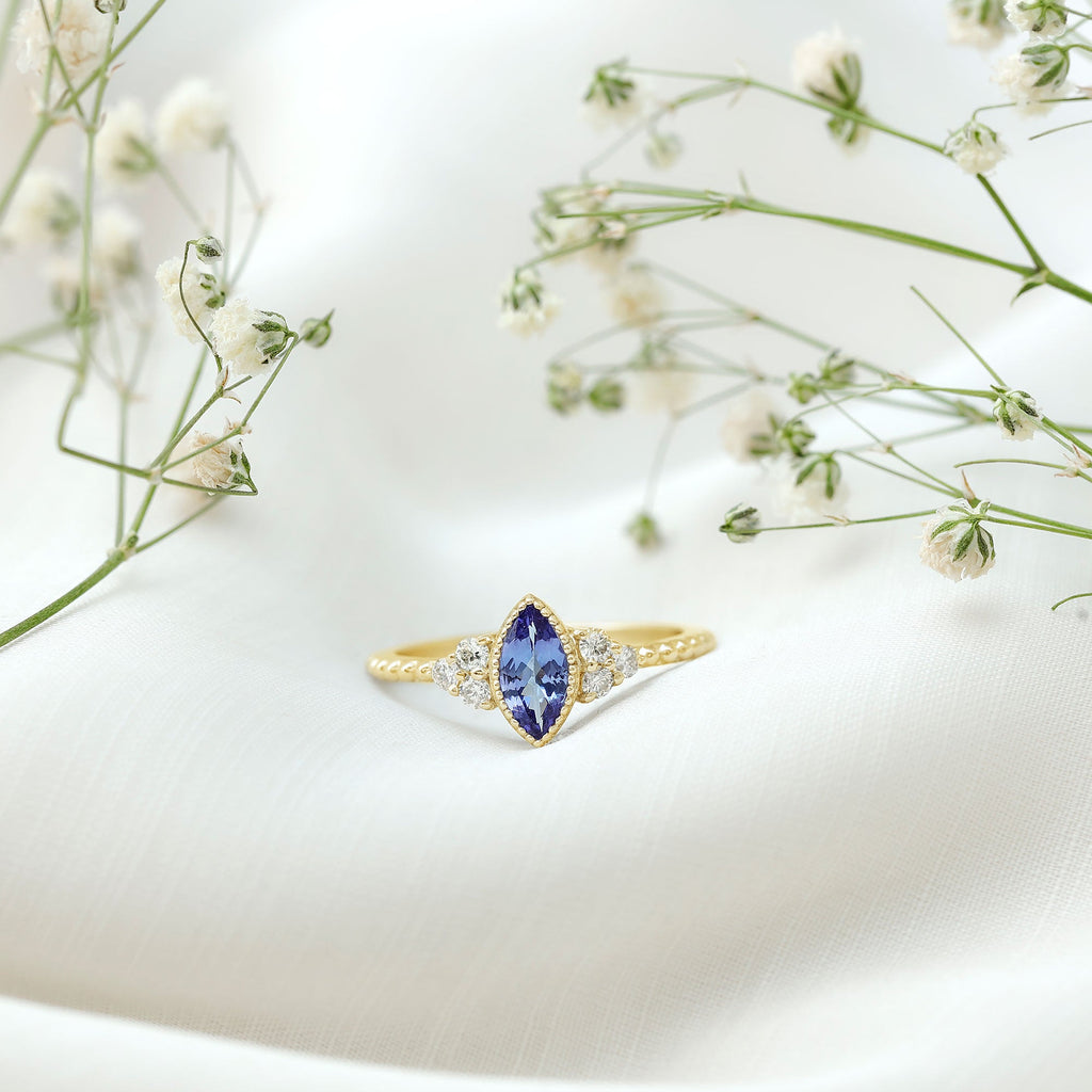 Vintage Style Marquise Tanzanite Promise Ring with Diamond Trio
