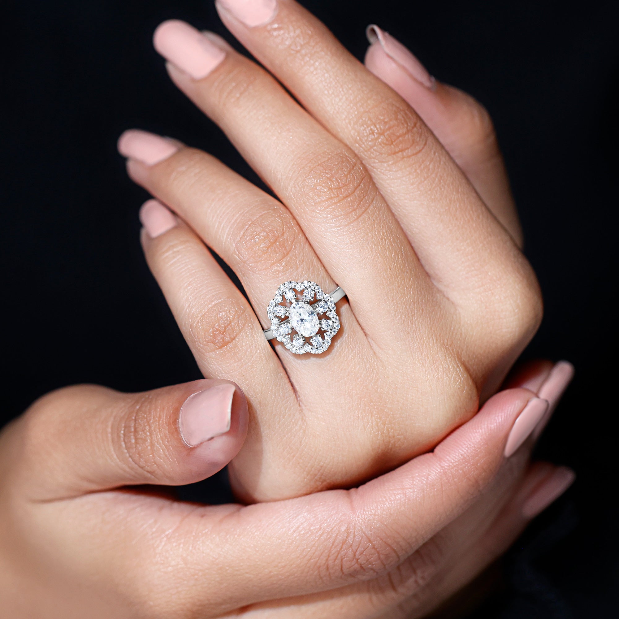 Oval Shaped Moissanite Flower Engagement Ring