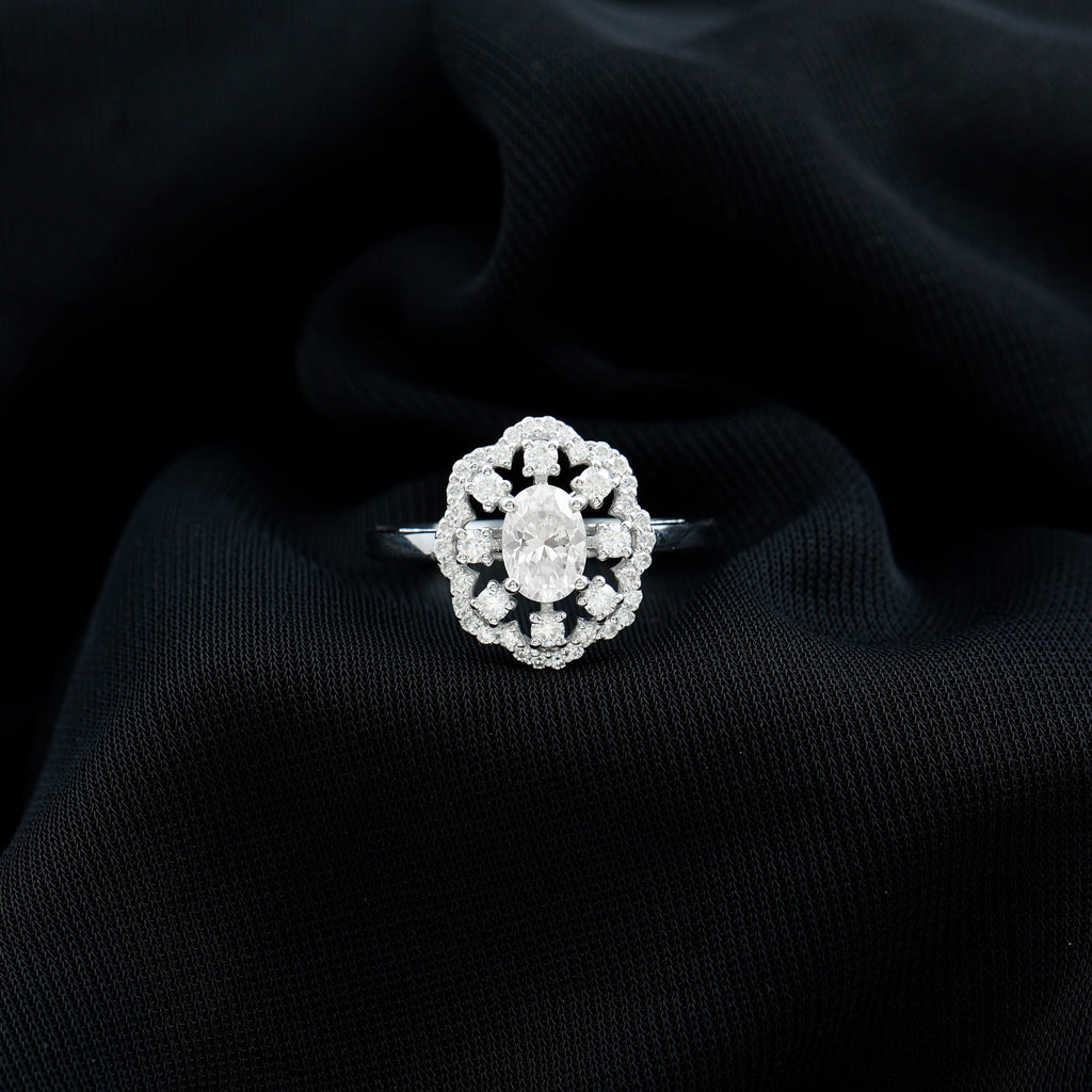 Oval Shaped Moissanite Flower Engagement Ring