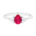 Natural 0.8 Carat Ruby Teardrop Engagement Ring with Diamond Trio