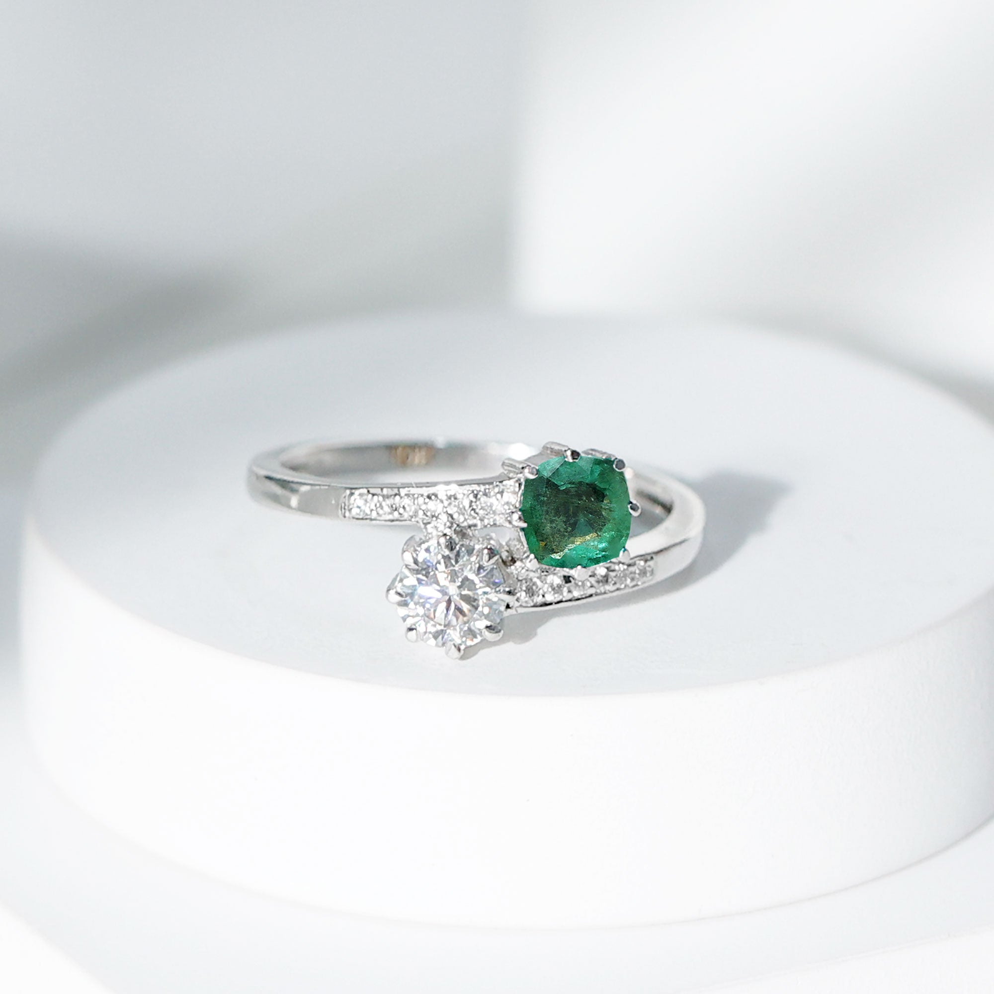 Emerald and Moissanite Two Stone Engagement Ring in Bypass Shank