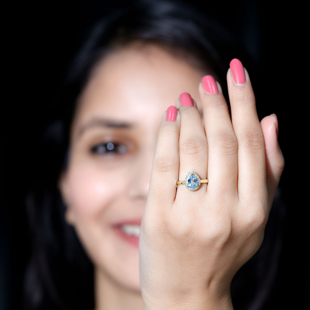 1 Carat Pear Cut Aquamarine Engagement Ring with Diamond Halo