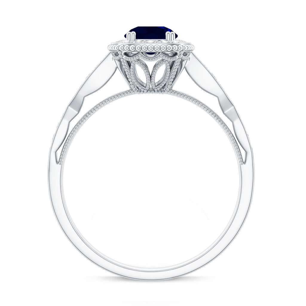 Round 0.9 Carat Blue Sapphire Antique Engagement Ring with Diamond Halo