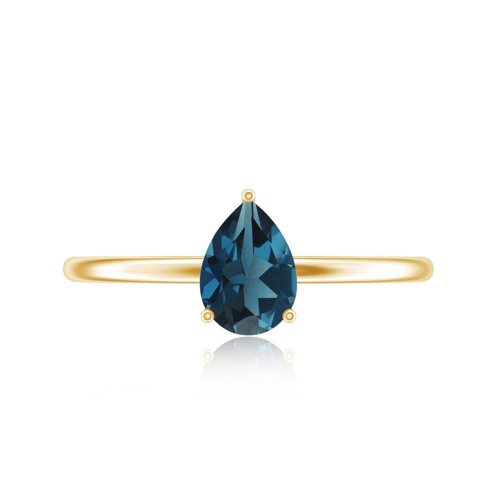 0.7 Carat Pear Shaped London Blue Topaz Solitaire Ring