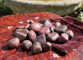 Red Ruby Crystal Tumbled (UV Reactive)(By The Piece Or Pound) | Home & Living > Home Decor > Home Accents > Rocks & Geodes | Wiccan Center