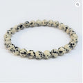 Dalmatian Jasper Round Bead Bracelet - Playful Loyalty | Bracelets | Wiccan Center
