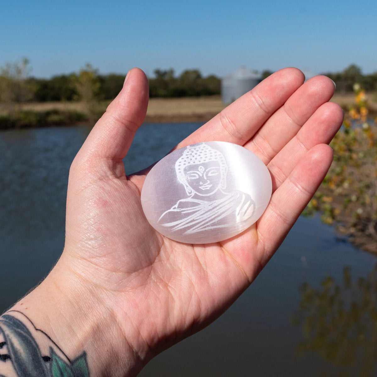 Buddha Engraved Selenite Palm Stone | Crystals | Wiccan Center