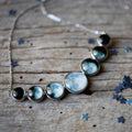 Varying Sized Curved Moon Phase Necklace in Silver | Necklace | Wiccan Center
