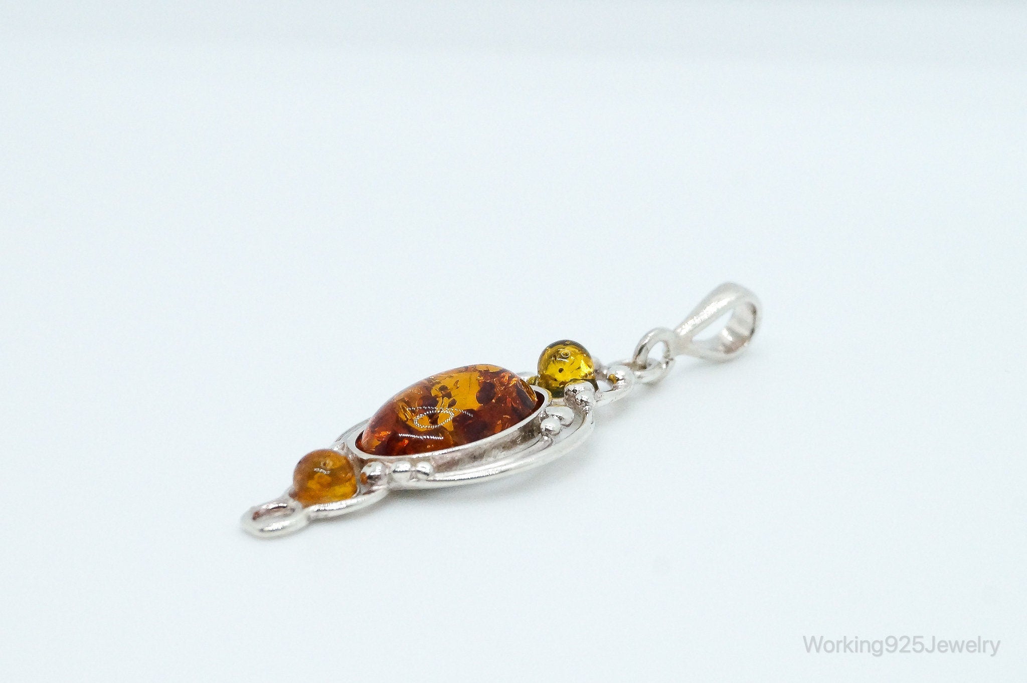 Vintage Multi Type Amber Sterling Silver Necklace Pendant | Jewelry > Necklaces > Pendants | Wiccan Center