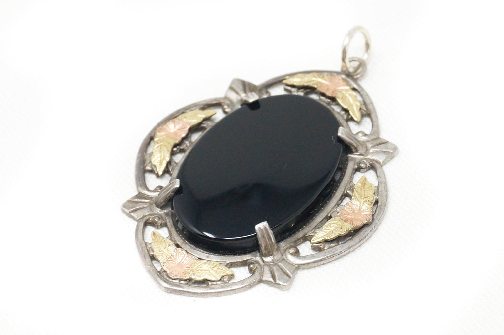 Antique Designer Uncas MFG Co Black Onyx Floral Sterling Silver Necklace Pendant | Jewelry > Necklaces > Pendants | Wiccan Center